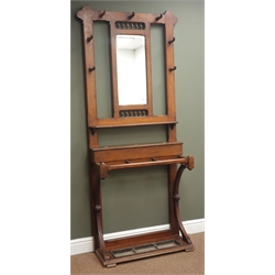  Early 20th century oak hallstand with bevel edge mirror, seven hooks, and compartment with hinged lid, W85cm, H196cm, D31cm  