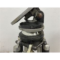 Three wooden adjustable tripods for plate cameras, together with a Linhof of Munchen metal tripod in a canvas case 