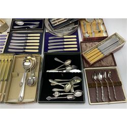 Silver plated decorative tray D20.5cm, together with a collection of flatware including three sets of cased butter knives, Community  cutlery teaspoons, spoons, knives etc. 