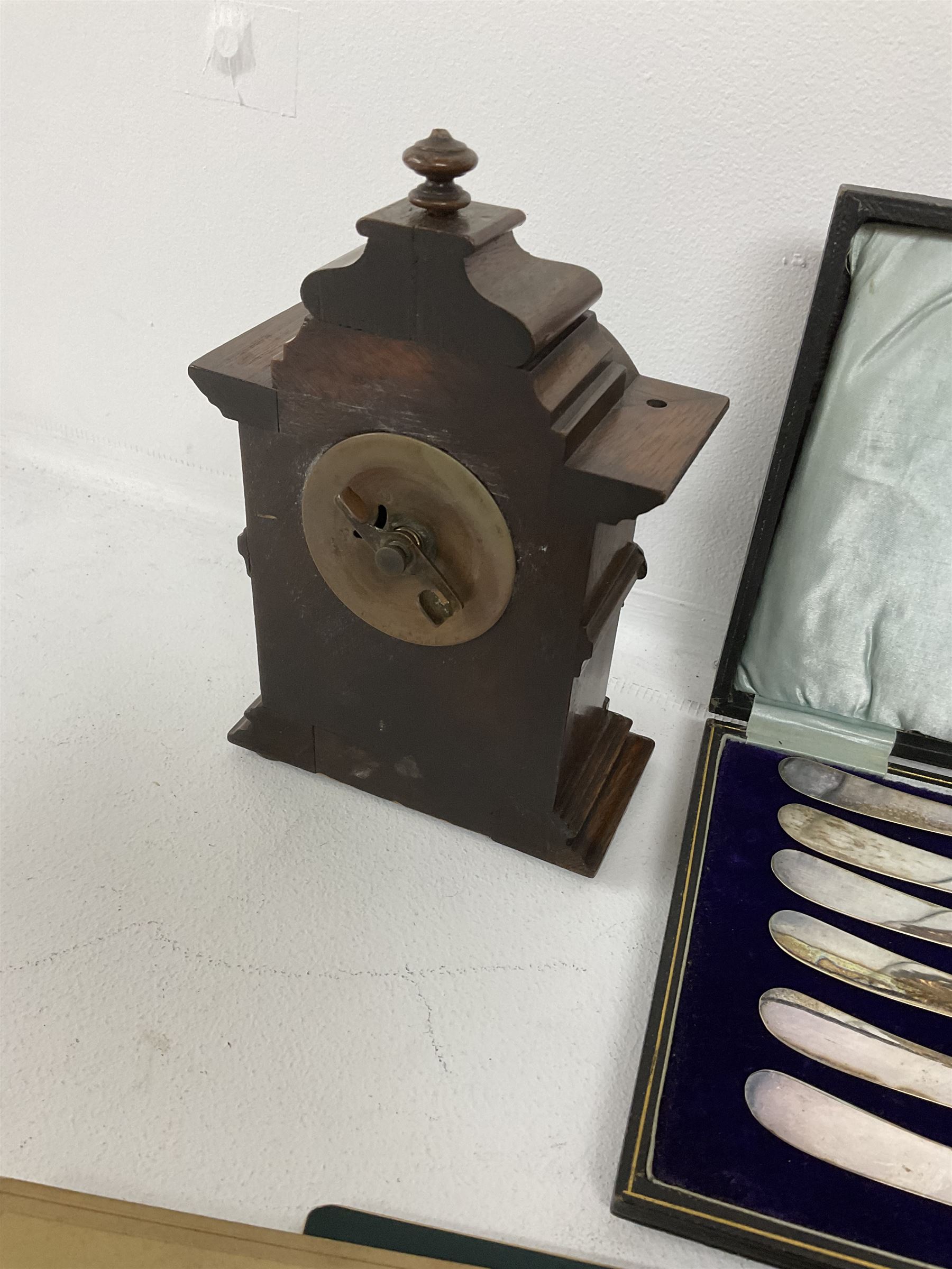 Quantity of mid 19th century and later photographs to include cartes des visites,  together with a small oval mirror, early 20th century clock, Bakelite cigarettes box, three hallmarked silver spoons, pair of Georgian spectacles with extending arms, silver and gold Plated reproduction icon, other silver plate and metal ware etc