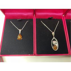 Six silver Baltic amber pendant necklaces, including dinosaur and butterfly designs, all stamped 925 
