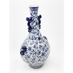 Large blue and white vase of tapering form with crackle glaze body, with lion mask and Dog of Fo moulded handles, H54cm.