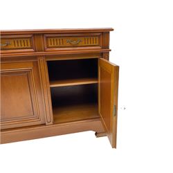 Contemporary cherry wood sideboard, rectangular moulded top over three drawers and three cupboards
