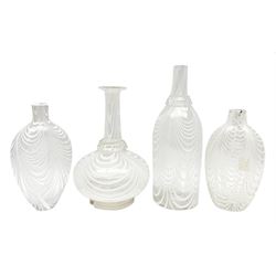 Group of Nailsea glass, comprising two bottles, one of shaft-and-globe form, and two flasks, each with white combed decoration, largest bottle H26cm, flasks approximately H19cm