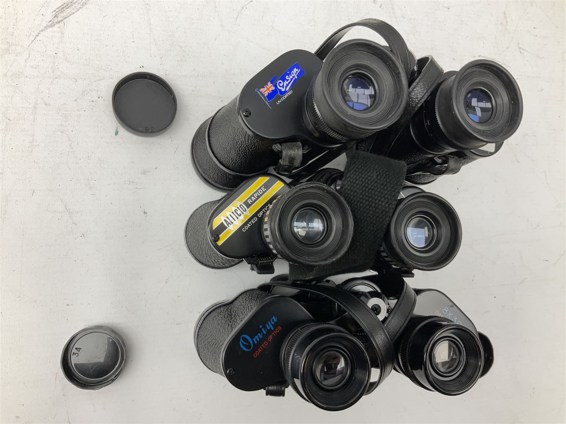 Eleven cased pairs of binoculars, to include Omiya 8x30, Tasco, Esde-Optik 8x40 Weitwinkel, Chinon 10x50 Field. Aico Rapide 8x30, Astralite zoom 6x- 14x32, etc