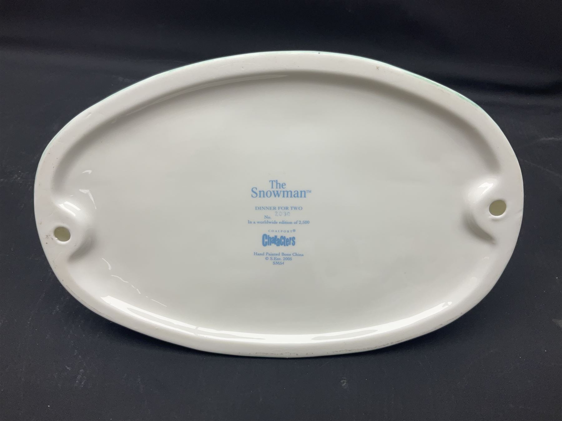 Three Coalport Characters The Snowman figures, comprising Dinner for Two, Off Piste and Winter Fun, all with certificates and original boxes 