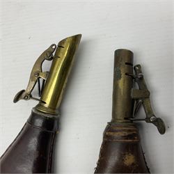 Two leather shot flasks with embossed decoration and brass nozzles; scissor action bullet mould with two ladles; pair of 19th century J.B. Warrilow hammer actions; small quantity of Staybrite buttons; and 1968 dated metal ammunition tin for 200 x 7.62 blank cartridges