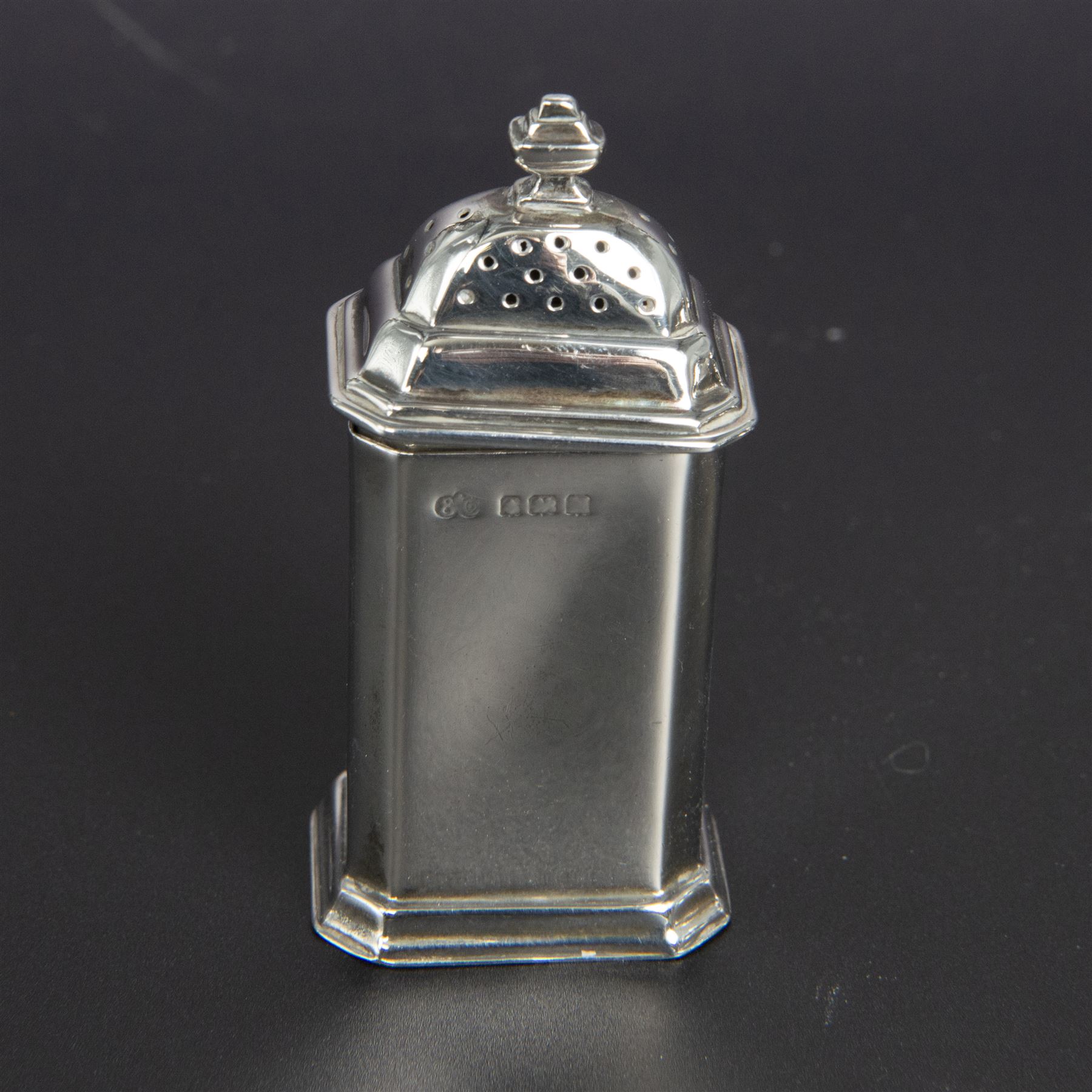 Group of silver cruets, including a pair of Edwardian conical shaped salt and pepper shakers and four other salt/pepper shakers, all hallmarked 