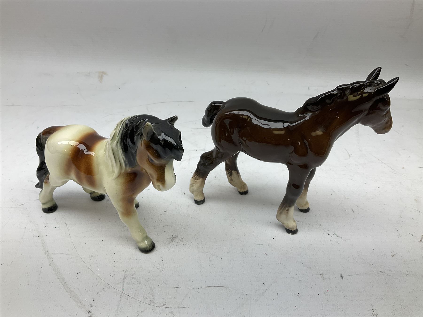 Seven Beswick figures of horses, including Connemara pony in grey no.1641, Arab in bay no.1265, large foal in grey no.947 etc, together with a Goebel figure of a horse (8)