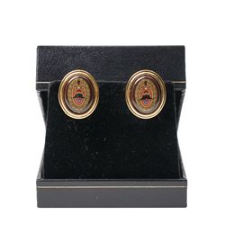 Michaela Frey gold plated and enamel suite of jewellery from the Greco-Roman collection, including a pair of oval stud earrings, hinged bangle and pendant on multistrand rope necklace, all boxed