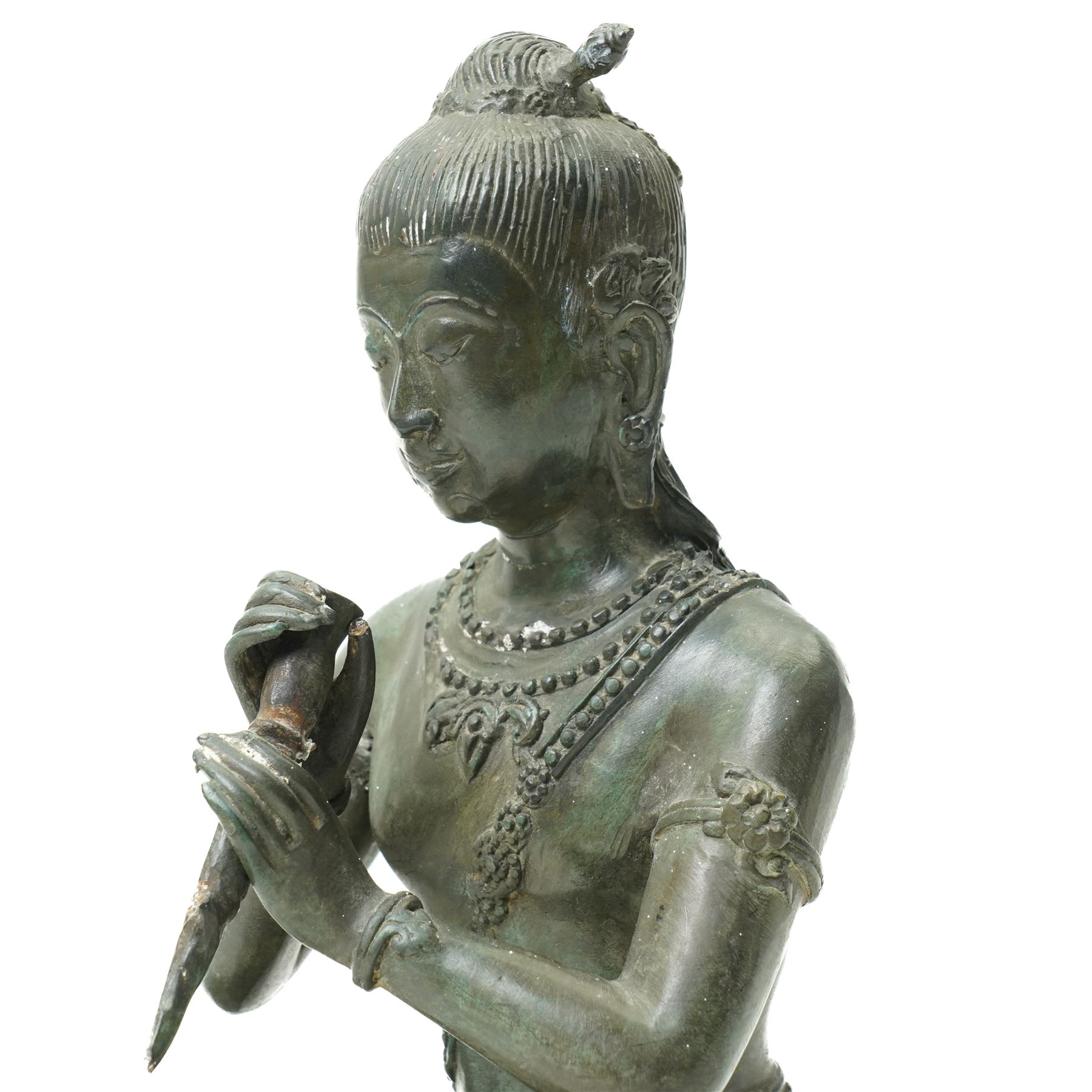 Early 20th century South East Asia bronze figure seated in the lotus position holding a dagger H28cm 