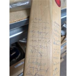 Two signed cricket bats, with signatures including Colin Cowdrey