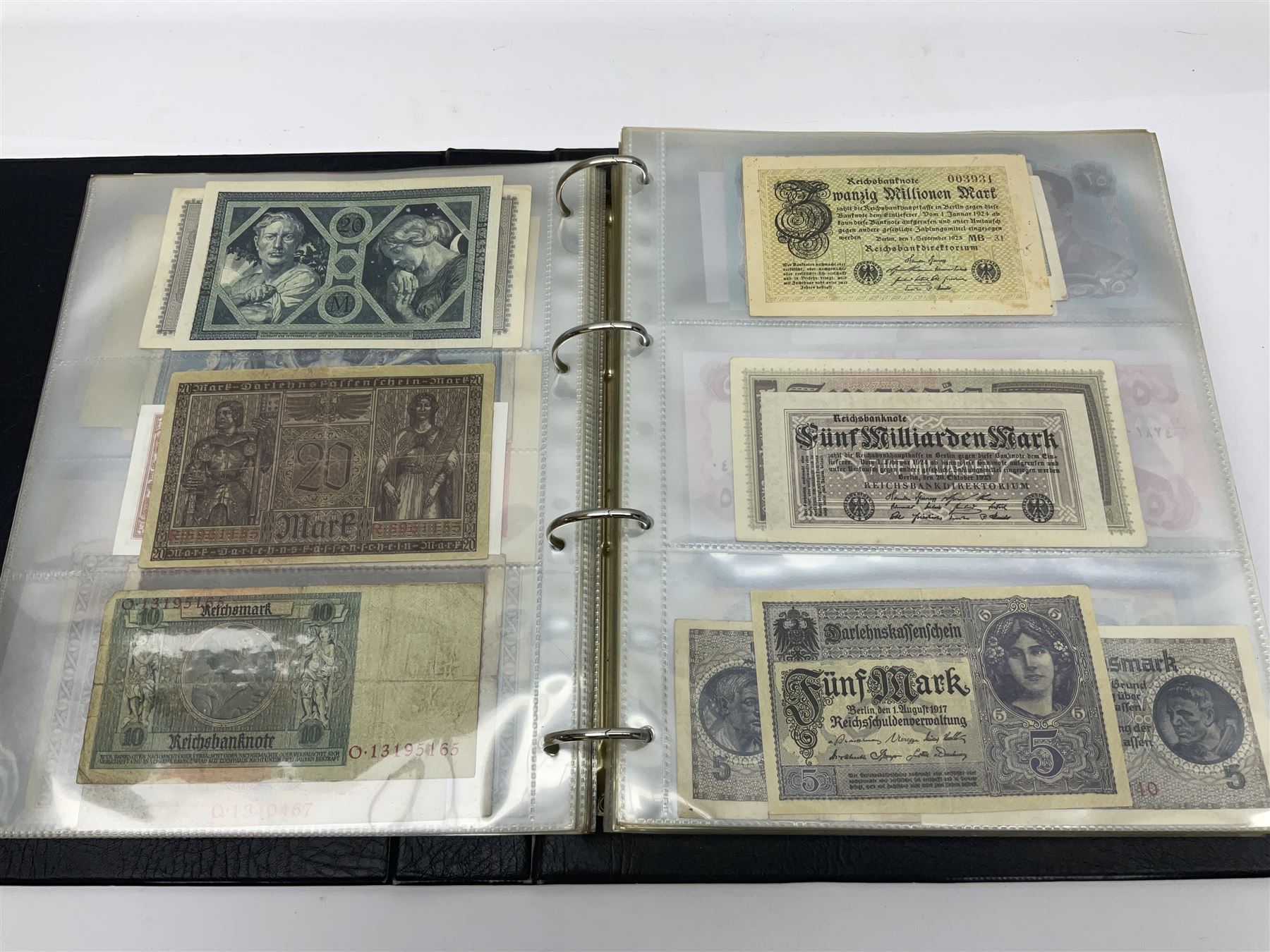 World and Great British banknotes to include Brazil, Canada, France, Germany, Ghana, Indonesia, Iraq, Hong Kong, Hungary, Japan, Vietnam, Zimbabwe, a collection of Chinese ‘Hell Money’, and quantity of ‘De La Rue Systems’ test notes, housed in ring binder and loose