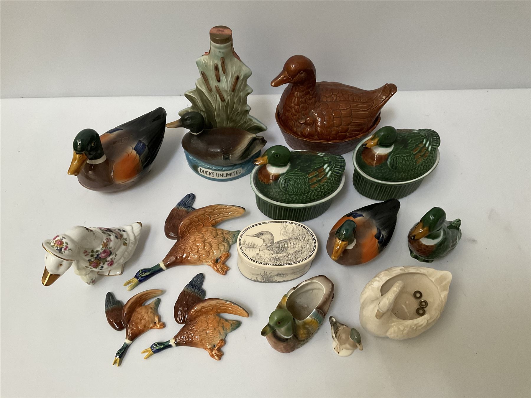 Five lidded duck tureens of various sizes to include majolica examples