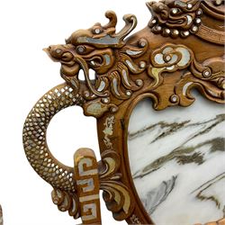 Pair of Chinese hardwood throne chairs, the back with grey marble inset surrounded by carved dragons and masks, inlaid with mother of pearl, the arm terminals carved with dragons, panelled seats inlaid with flowers and foliate motifs, on ball and claw carved cabriole feet