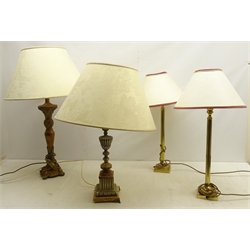  A carved metal lamp with marble plinth, another carved stem lamp and a pair of lamps, all with fabric shades, the tallest being 82cm incl lampshade (4)  