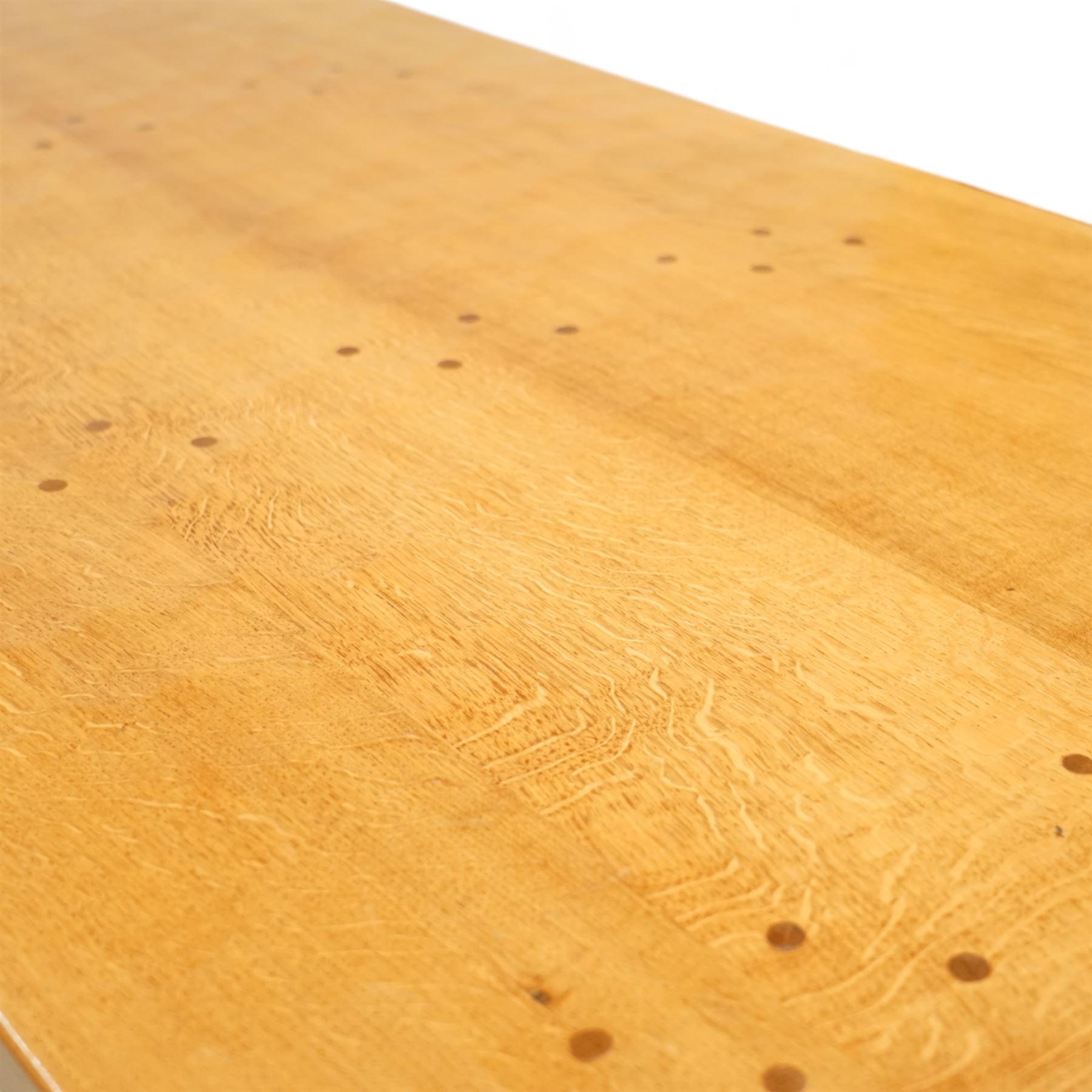 Mouseman - adzed oak 6’ refectory dining table, rectangular top with visible dowel pegs and adzed surface, raised on octagonal carved supports with stretcher and sledge feet, carved mouse signature to leg, by the workshop of Robert Thompson, Kilburn
