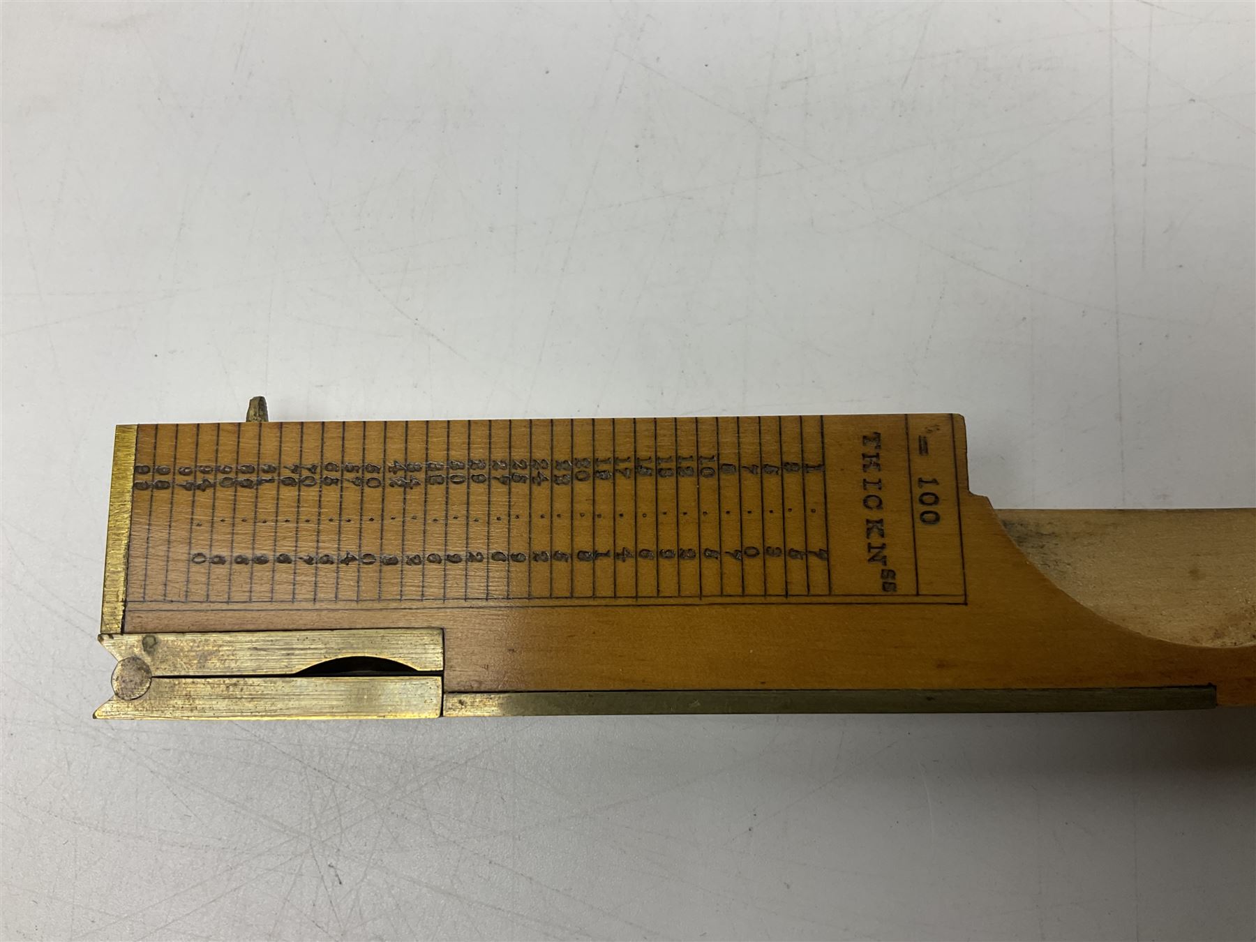 Late 19th/early 20th century boxwood and brass clinometer rule by Stanley, with inset magnetic compass, screw action protractor hinge divided to one degree with rise in inches per yard scale under, spirit level to one edge, marked 'W.F. Stanley Great Turnstile Holborn' with tables of distances, angles and thickness H16cm closed: in original leather covered case with instructions