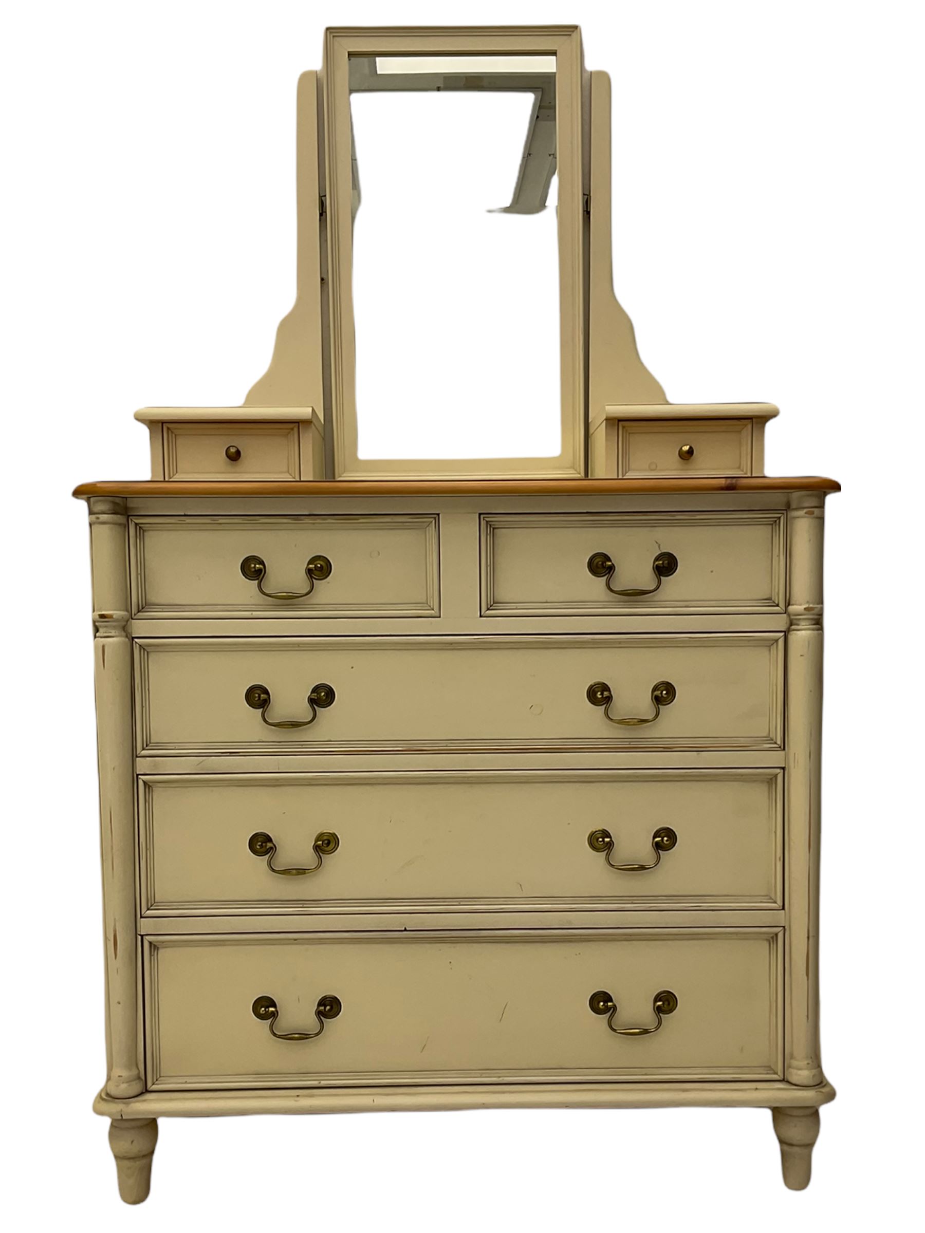 Laura Ashley pine and cream finish vanity chest, fitted with two short and three long drawers, swing mirror back