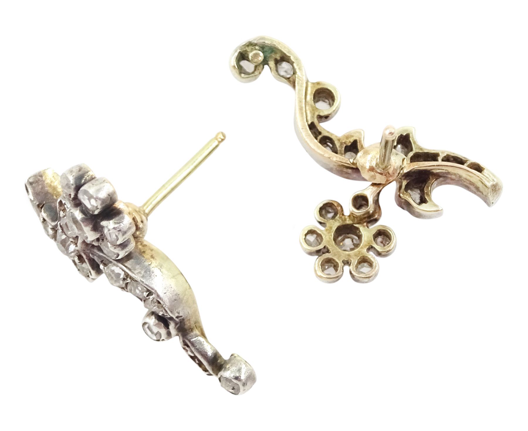 Pair of early 20th century 9ct gold and silver, old cut and rose cut diamond foliate stud earrings
