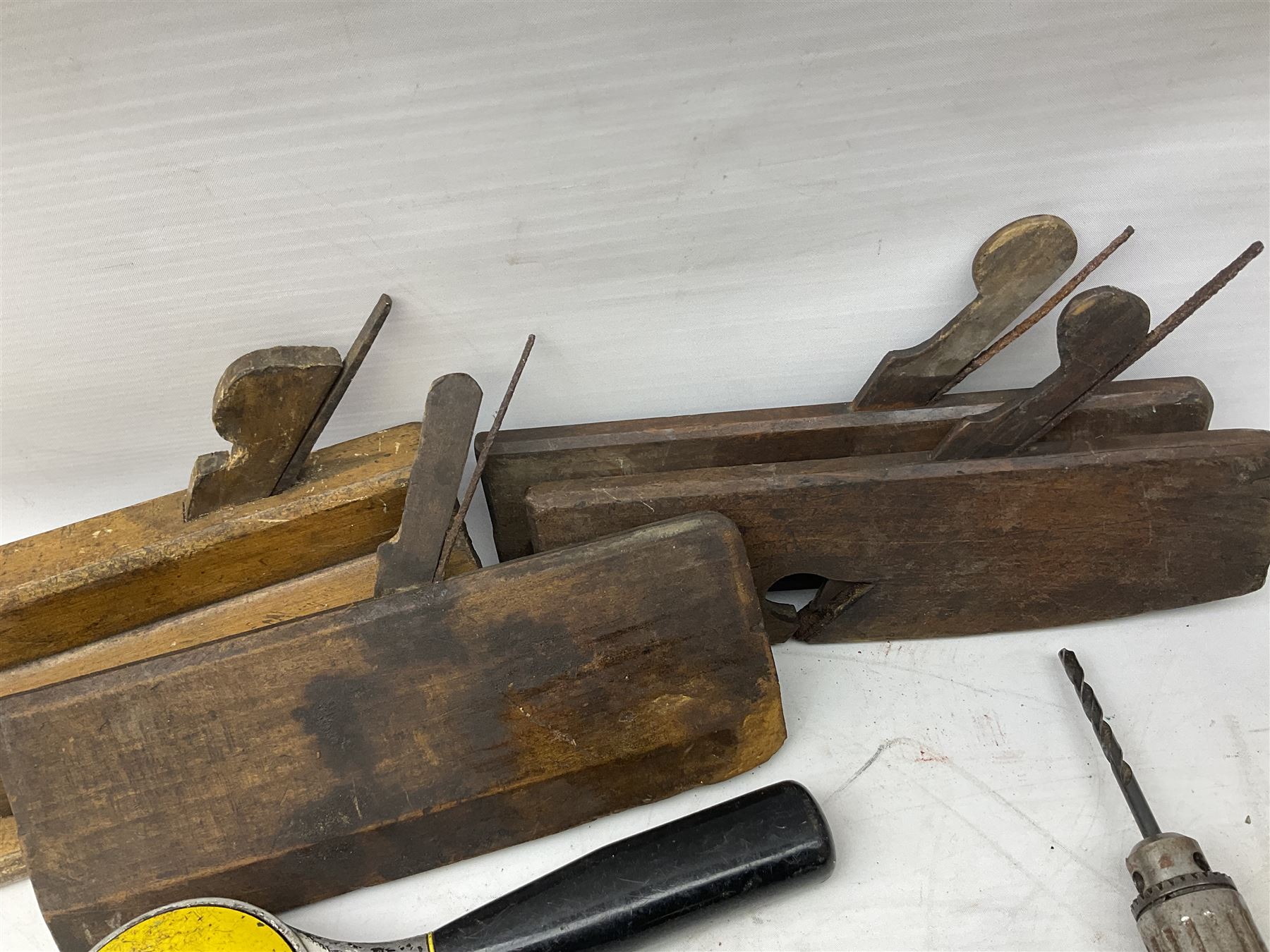 Quantity of woodworking tools, comprising hand drills to include Stanley No. 803 and No. 5803, Qualcast Clipper etc, together with collection of planes to include moulding examples and rebate plane of stepped form, and further tools including chisels etc