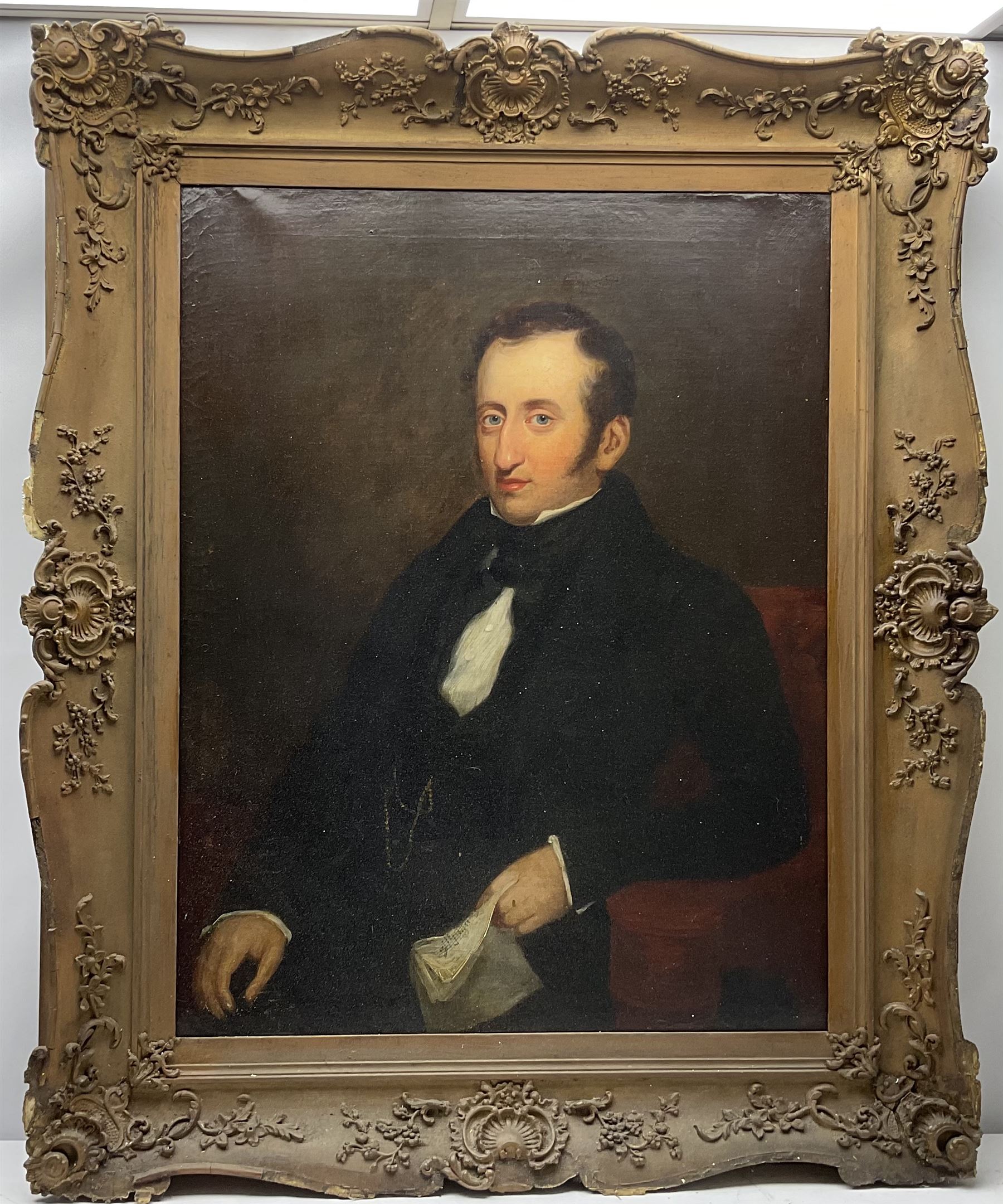 English School (19th century): 'Joseph Clegg 1810-1846' holding musical score, oil on canvas unsigned, titled on the stretcher  90cm x 70cm