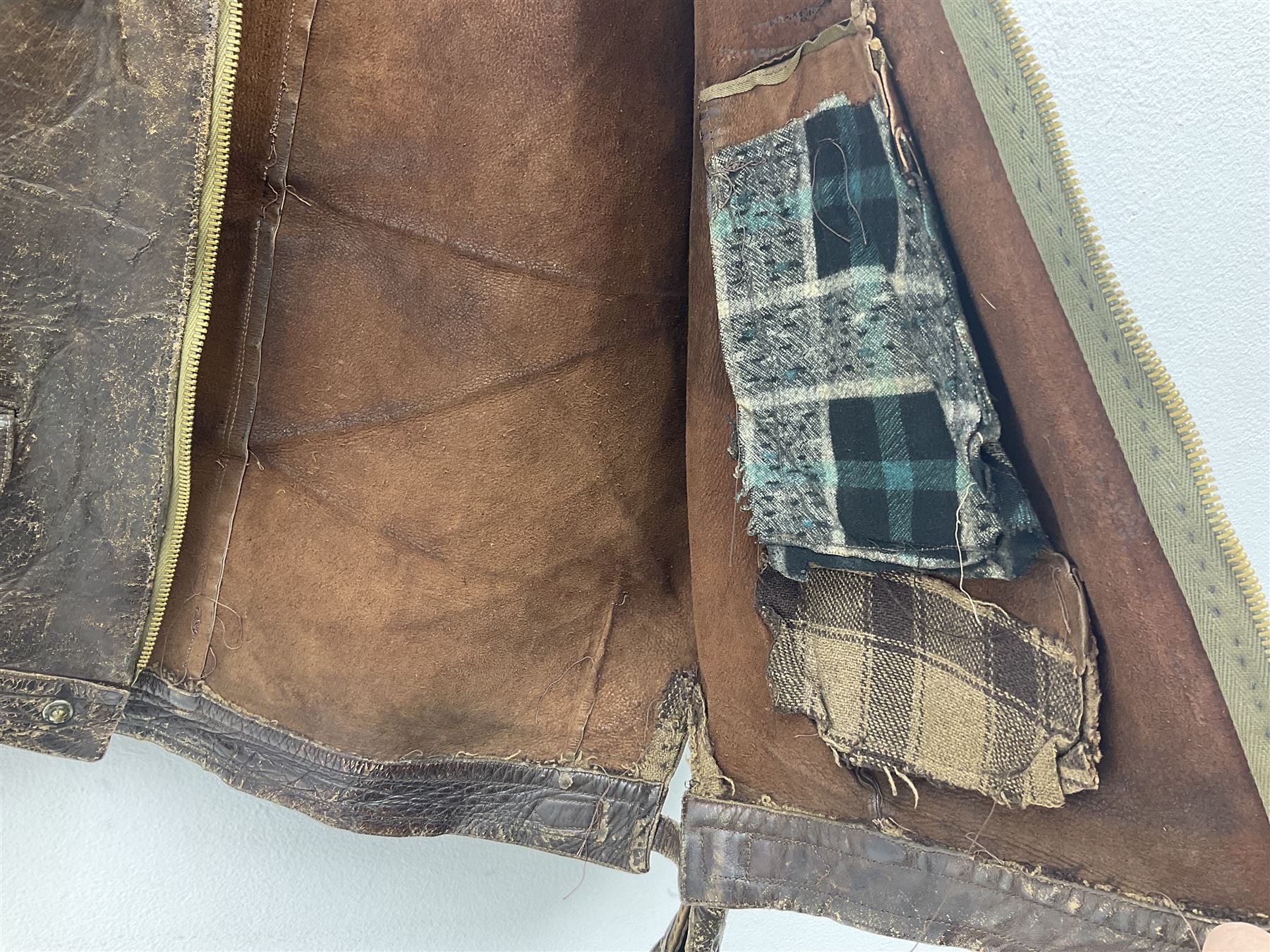 German Luftwaffe Hartmann leather jacket with tartan pocket linings, pocket zip pulls marked 'Eclair Bte.S.G.D.G.'