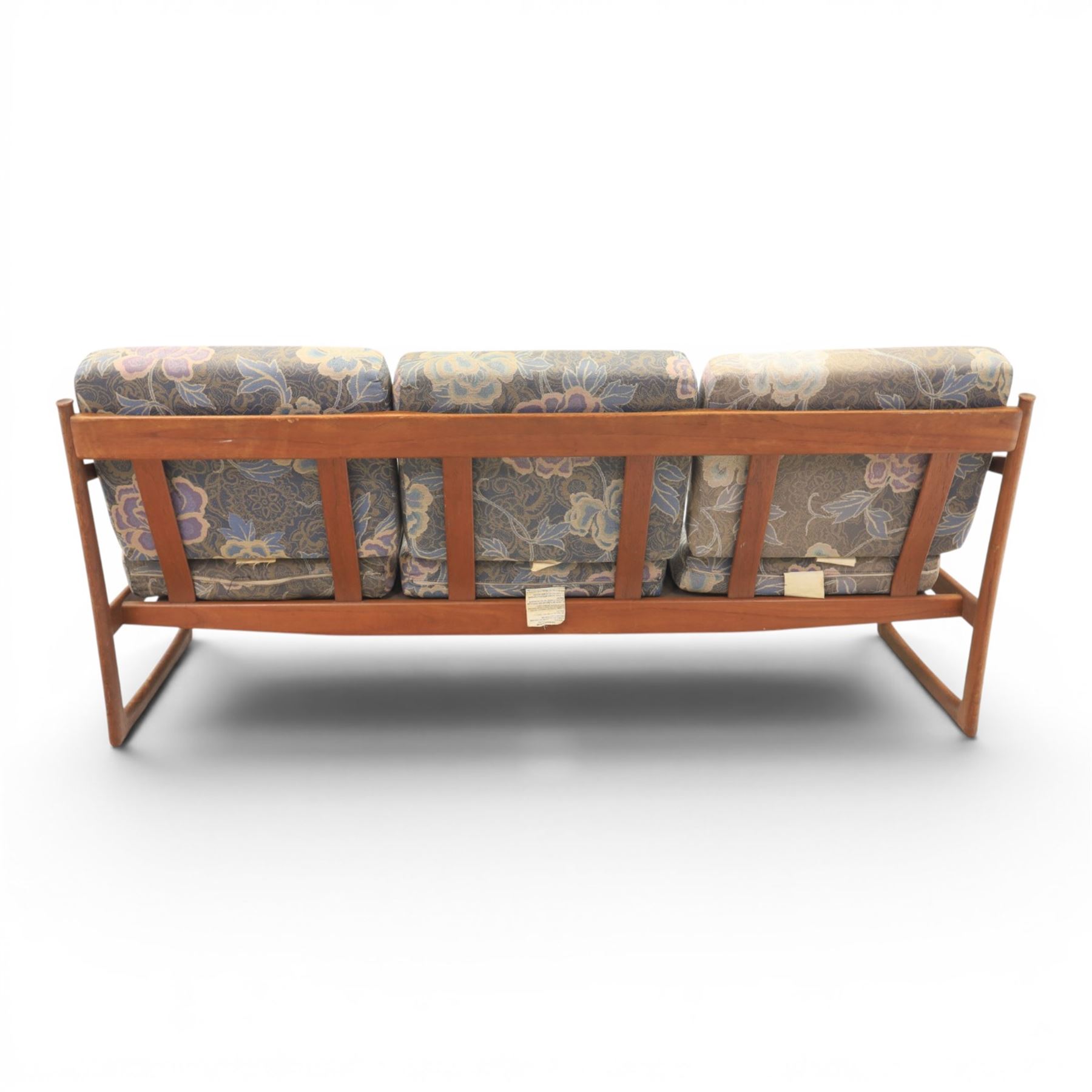 Peter Hvidt and Orla Mølgaard for France and Son - mid-20th century model FD130 teak framed three seater settee, foliate design loose cushion 