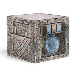 Troika cube vase by Anne Lewis, with geometric incised decoration in blue on a mottled blu...