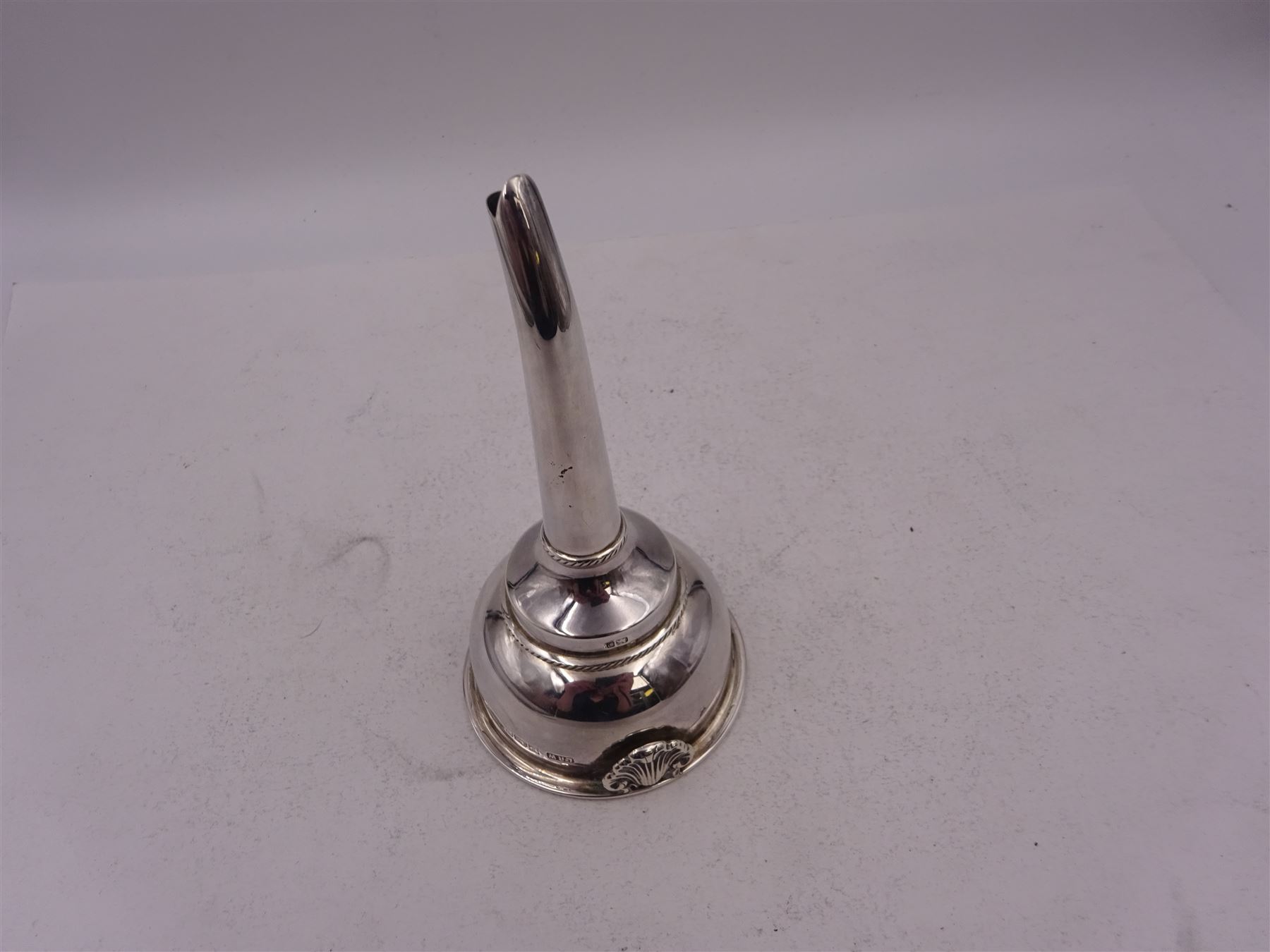 Modern silver wine funnel, of typical form, with oblique gadrooned rim, and shell decoration, hallmarked Laurence R Watson & Co, Birmingham 1989