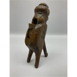 Rare primitive treen lever action nutcracker, probably late 17th/early 18th century, carved in the form of a man, with old collector label to side inscribed 'A Nutcracker XVI Century', H18cm