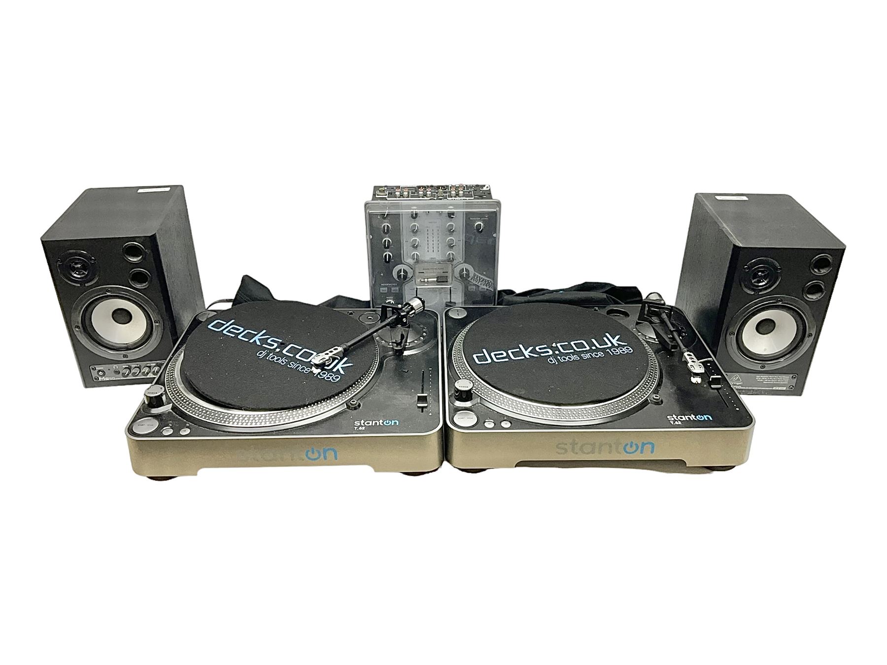 Two Stanton T62 record decks, together with a pair of Behringer MS40 speakers and a Pioneer DJM 250 2 Channel DJ Mixer
