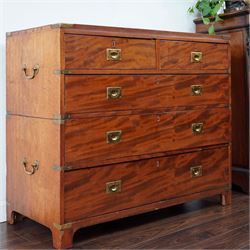 19th century figured mahogany military campaign chest of drawers in two sections, the rect...