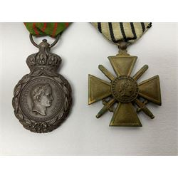 Four French medals - St. Helena medal with bust of Napoleon to obverse and inscription to reverse 'Campagnes de 1792 a 1815. A ses compagnons de gloire sa derniere pensée Ste. Hélène 5 Mai 1821', established by Emperor Napoleon III in 1857; two WW2 Croix-de-Guerre; and WW2 Croix-du-Combattant; all with ribbons (4)