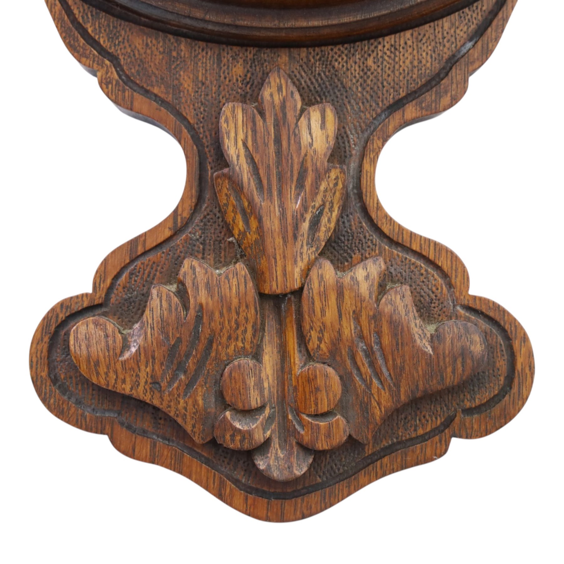 Late Victorian carved oak aneroid barometer, the foliate crest above a glazed thermometer and circular dial, with further carved decoration below, H 75cm