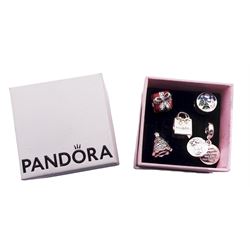 Five silver Pandora charms including Pandora shopping bag, Christmas tree, wrapped present, Winter scene, and snowman with reindeer droplet charm, all stamped S925 ALE, with one Pandora box 