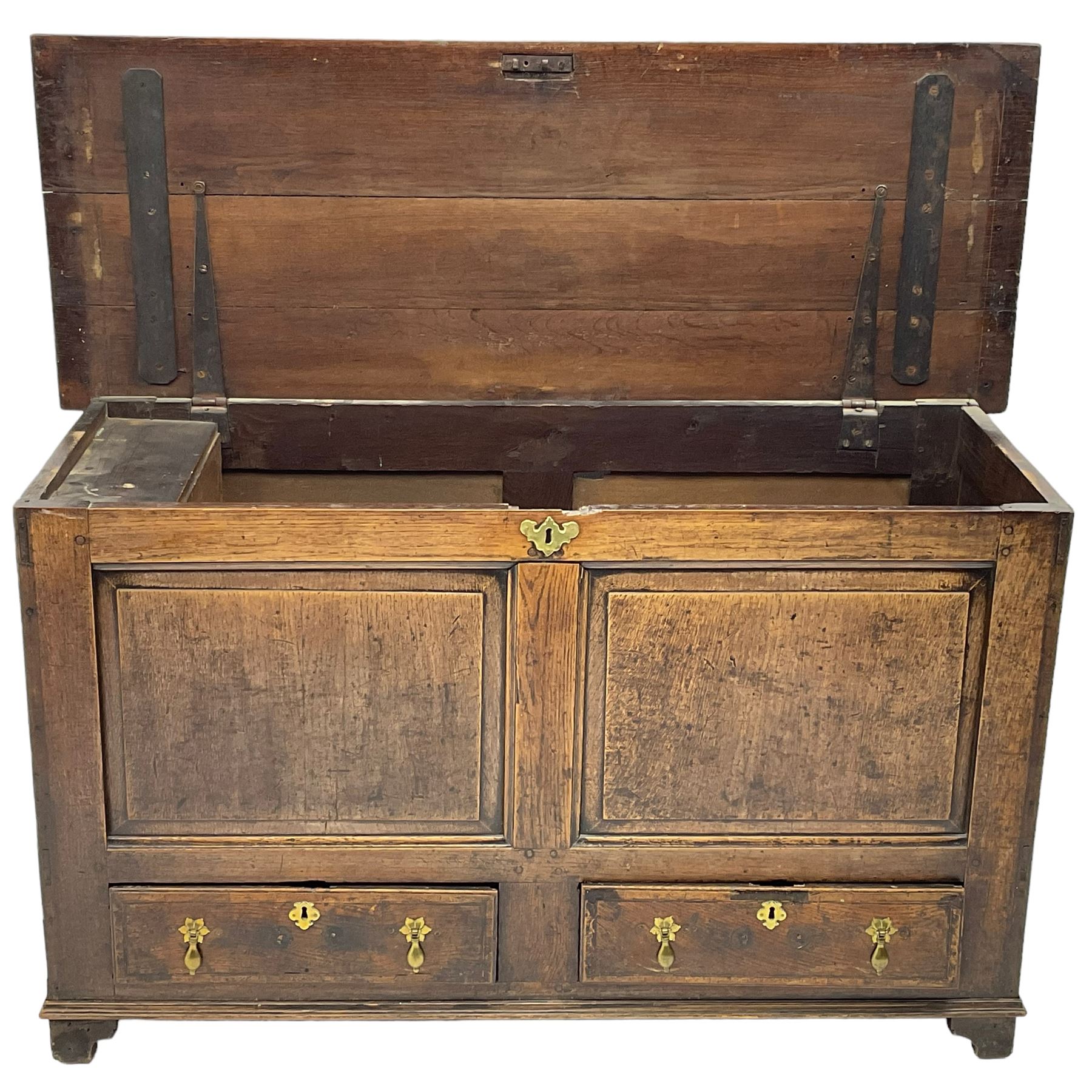 18th century oak mule chest, moulded hinged lid over panelled front, fitted with two moulded drawers