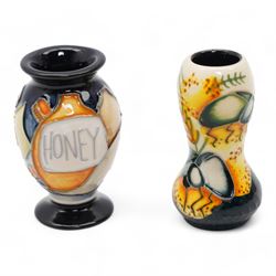 Seven Moorcroft miniature vases, various patterns including snowdrops, beetles, insects, cat fish etc, H6cm max (7)