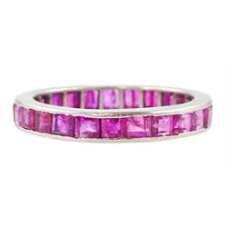 Platinum channel set, calibre cut ruby full eternity ring  