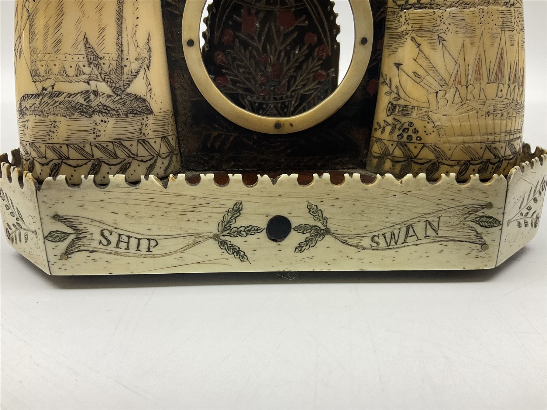 19th century scrimshaw pocket watch stand with two sperm whales teeth and central baleen watch holder; etched for the sailing ship 'Emma' at Warren Rhode Island and dated 1852, H14cm Notes: Warren was an active whaling port from the mid 18th century and became the leading whaling port of Rhode Island in the early 19th century, sending on average twenty whalers per year. The last whaler departed from Warren in 1865, following the decline of the whaling industry. 