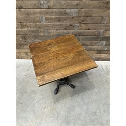 Cast iron Britannia circular pub table, and two pedestal cast iron bases (3)