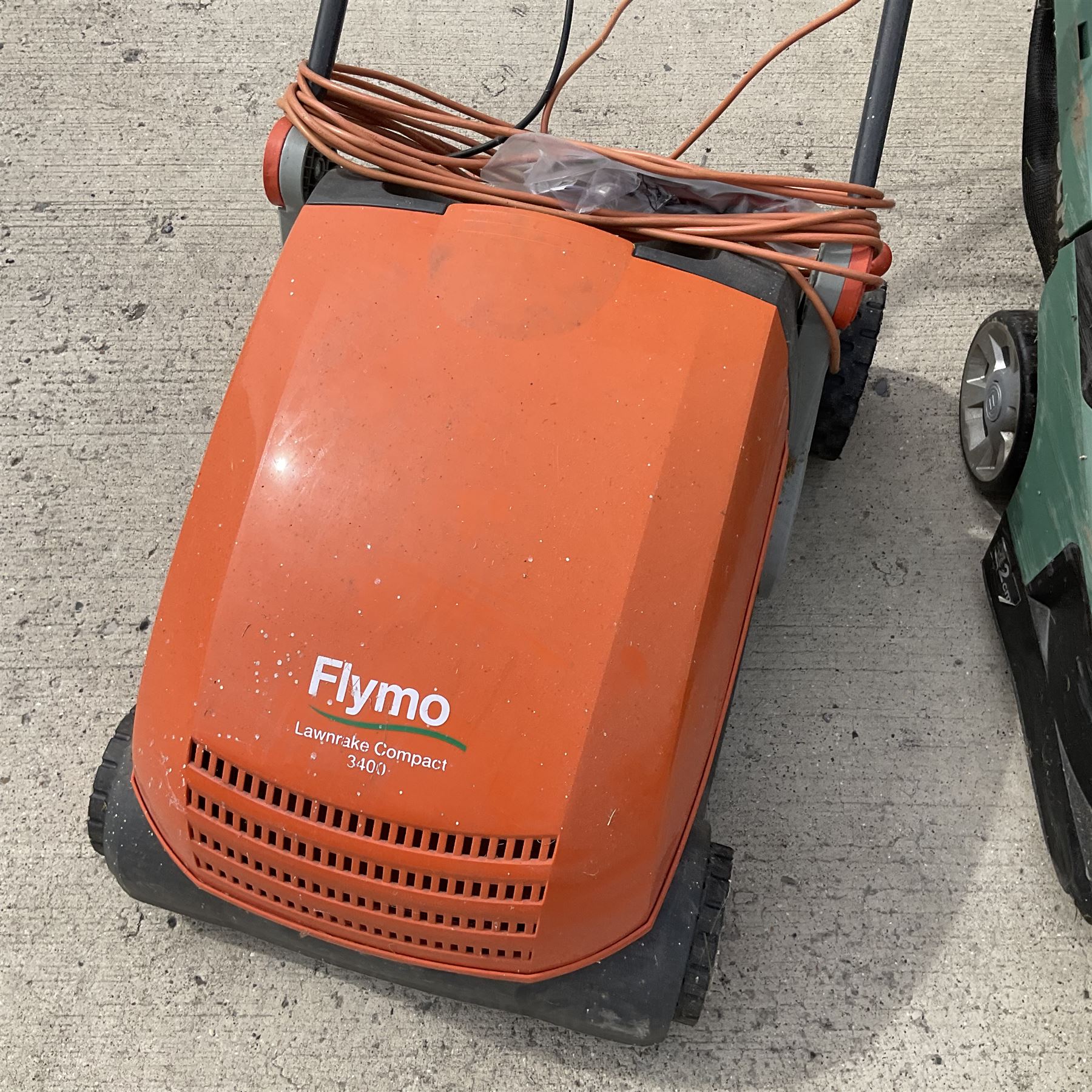 Bosch  Rotak 650 and Flymo lawnmower and garden rake - THIS LOT IS TO BE COLLECTED BY APPOINTMENT FROM DUGGLEBY STORAGE, GREAT HILL, EASTFIELD, SCARBOROUGH, YO11 3TX
