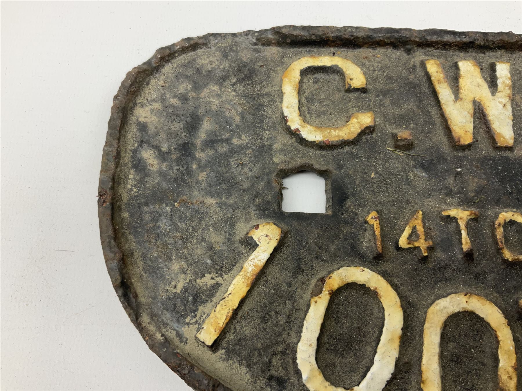 Three cast iron railway wagon plates of D shaped form to include Southern Railway, LMS and GWR, L27.5cm