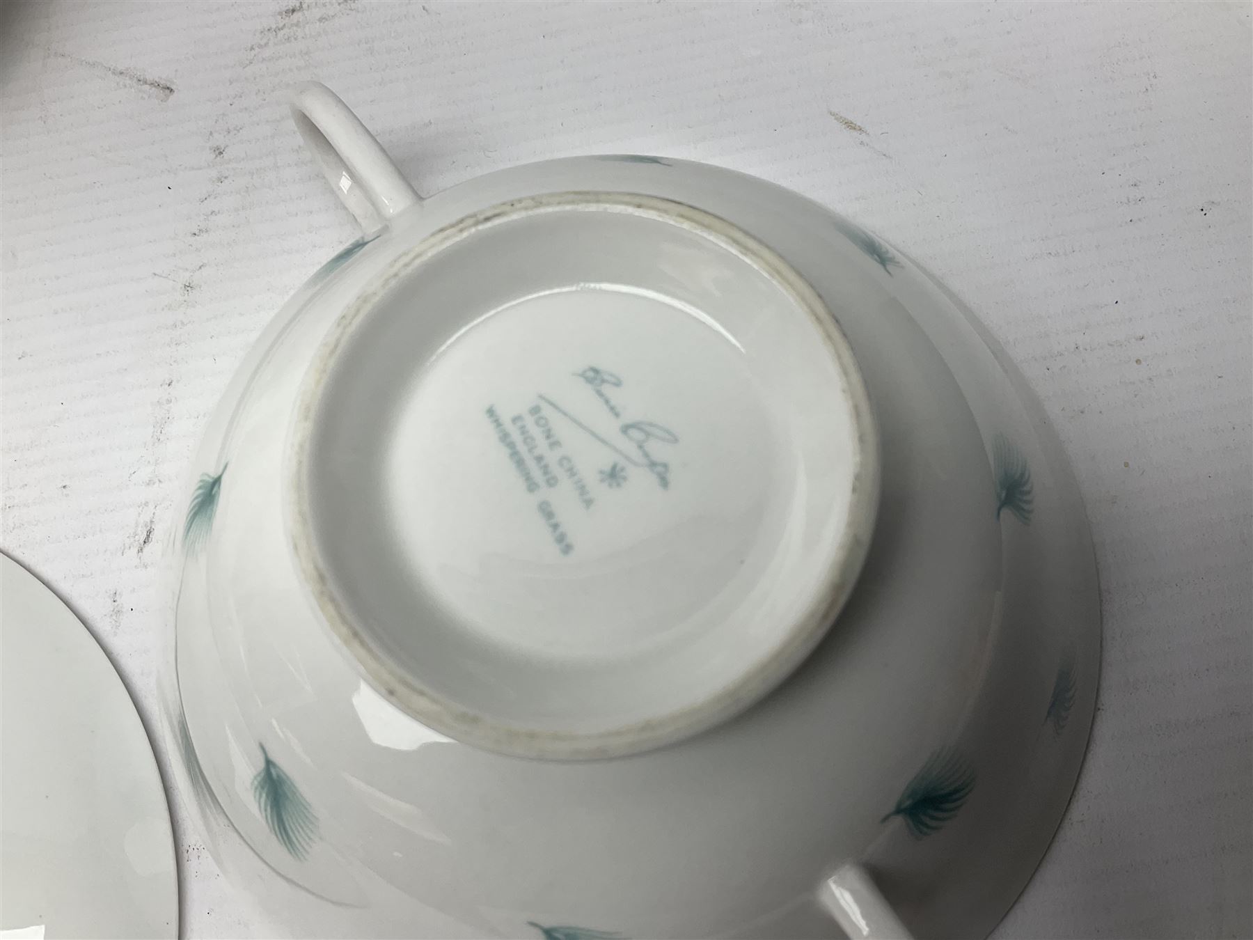 Susie Cooper Whispering Grass pattern dinner wares, to include tureen with cover, six twin handled soup bowls, dinner plates and side plates, etc 