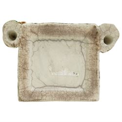 Yorkshire Prattware cottage, circa. 1820, in shades of blue, ochre and white, moulded in relief with two flanking gentlemen figures, H12cm 