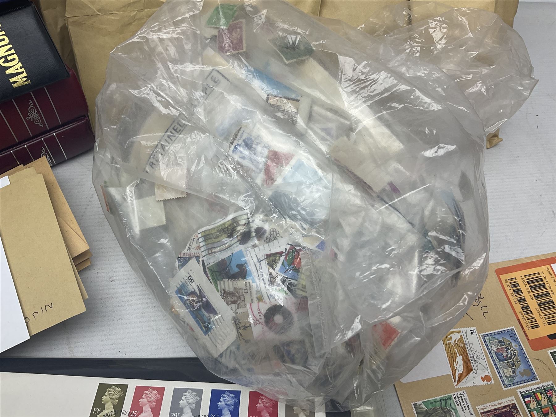 World stamps including Australia, Antigua, Canada, New Zealand, St Vincent, Republic of Maldives, Norfolk Island, Malta etc, Great British and other first day covers, Queen Elizabeth II 60th Birthday commemorative stamps etc, housed in five albums/folders and loose, in one box