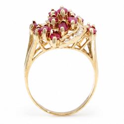 14ct gold ruby and diamond cluster ring, set with fifteen marquise cut rubies and fourteen channel set round brilliant cut diamonds, stamped 585