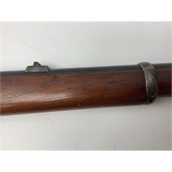 Manton .577/450 Martini Henry rifle, the 82.5cm smooth bored barrel proofed for shot, two barrel bands and bayonet fitting, engraved action with side safety, figured walnut stock with chequered steel butt plate, complete with ramrod, NVN other than 5346 on barrel, L125cm