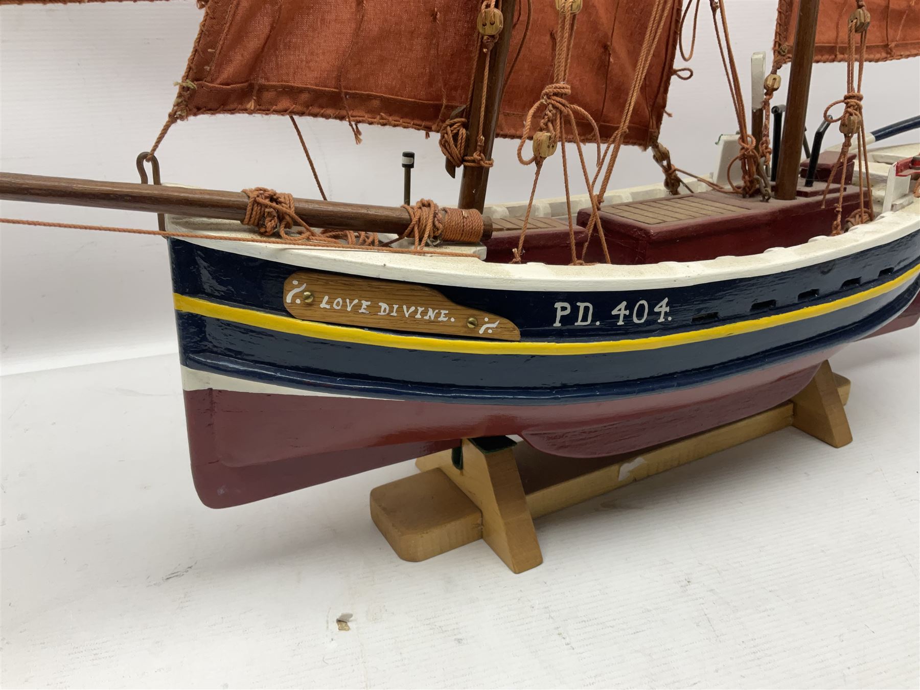Wooden model of the Peterhead Herring Fishing Boat, Love Divine, PD404. on stand together with Wick Herring Fishing Boat, Galilee WK.1. on stand, L105cm, H64cm