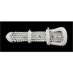 14ct white round brilliant cut diamond belt bracelet, the bracelet with rubover set diamonds, the buckle and clasp with pave set diamonds, stamped 14K, total diamond weight 5.35 carat